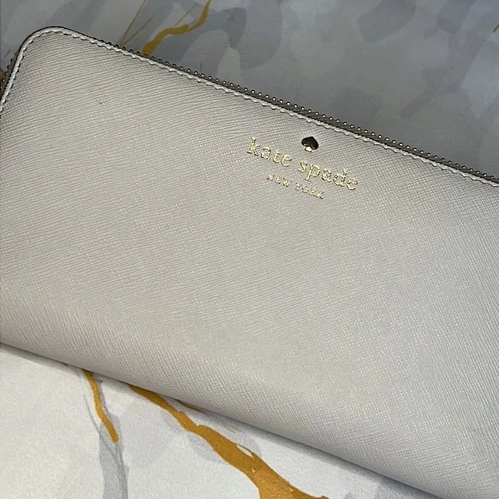 *Kate spade very light, gray wallet, large zip with multi card slots